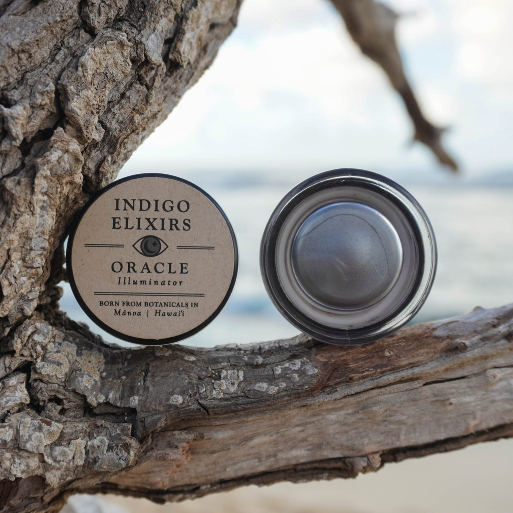 Indigo Elixirs Oracle illuminator against a natural background